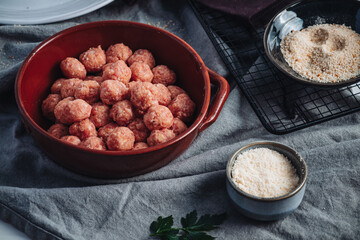 Raw home made Italian traditional meatballs