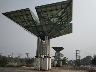 Cityscape of glass made design watchtower near road side at Siliguri, West Bengal, India