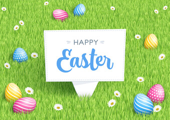Easter Eggs In Field of Green Grass Background