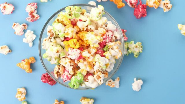  Popcorn In A Bowl On Blue Background Top Down 