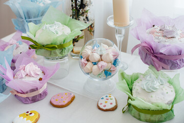 Beautiful Easter cakes on a decorated light table. A light holiday of Easter.