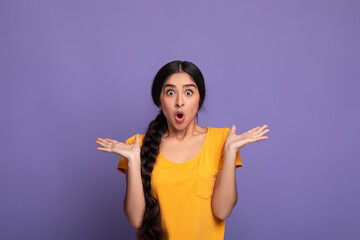 Close up portrait of shocked young indian woman