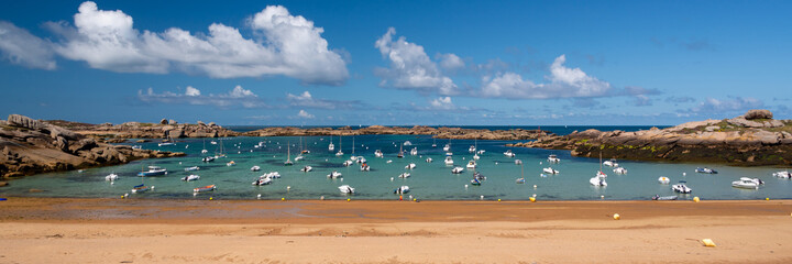 Sailing boats on Coz-Pors beach in Tregastel, Côtes d'Armor, Brittany, France