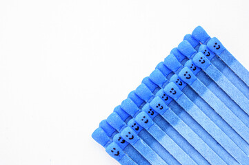 matchsticks with faces painted on the heads