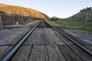 Fototapeta na wymiar low angle picture of railway track with vanishing perspective