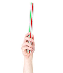 Man's arm raised holding a office supplies: ruler. Isolate on white background.