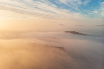 Fototapeta na wymiar Above view La Manga city during heavy fog misty weather. Spain