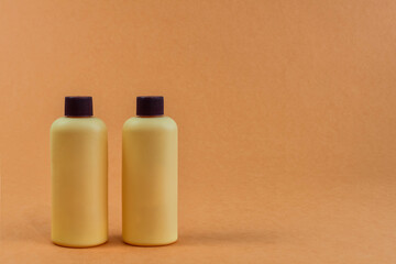 Set of plastic bottles on orange background. Recycling concept and environment.