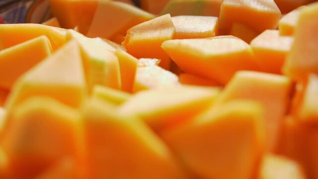 Close-up of chopped pieces of fresh cantaloupe melon