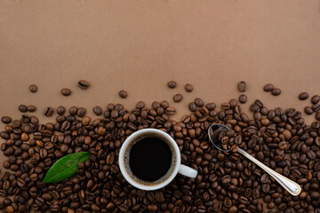 Coffee cup and beans, top view with copyspace for text