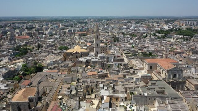 Lecce,Puglia,Italy Beautiful panoramic aerial 4K video from flying drone to Lecce Historic city center, CaLecce. Historic city center, Cathedral of Maria Santissima Assunta, on a beautiful summer day.