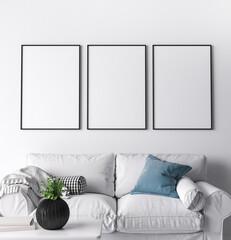 Frame mockup in modern living room design, three black frames on bright white wall, 3d render