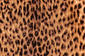 Foto op Canvas Colored fabric background with the image, print of a wild predator - leopard, cheetah, close-up © Мар'ян Філь