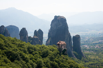 Fototapeta na wymiar Beautiful landscape with Meteora mountains and orthodox monastery. Greece