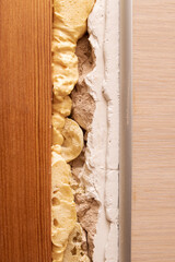 Polyurethane foam in the joint on wall