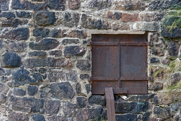 Window with iron shutters.