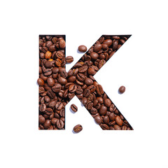 Letter K of English alphabet made of natural coffee beans and paper cut isolated on white. Typeface for coffeehouse