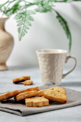 Fresh homemade cookies on a napkin on a light background