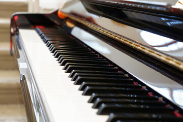 Piano keys. Side view with shallow depth of field