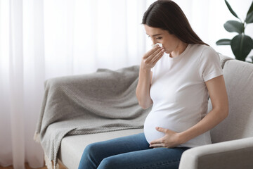 Obraz premium Sick Pregnant Lady Feeling Unwell At Home, Having Grippe Or Flu