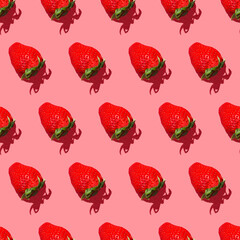 Seamless pattern fresh strawberry isolated on pink background top view.