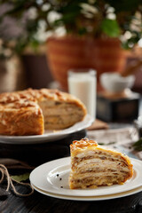 Kurnik is a national Russian dish, Pie made of pancakes, chicken, mushrooms and puff pastry. © Savory