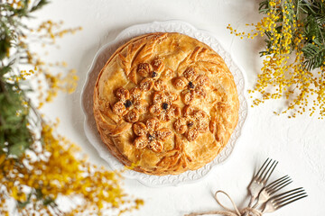 Kurnik is a national Russian dish, Pie made of pancakes, chicken, mushrooms and puff pastry. © Savory