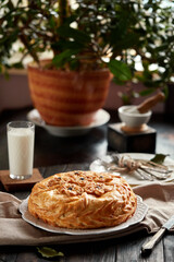 Kurnik is a national Russian dish, Pie made of pancakes, chicken, mushrooms and puff pastry. © Savory