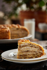 Kurnik is a national Russian dish, Pie made of pancakes, chicken, mushrooms and puff pastry. © Savory