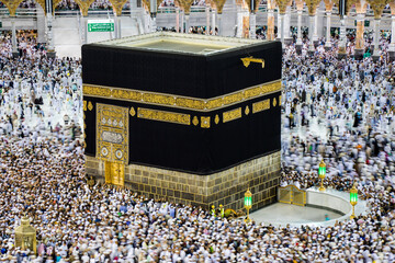 Holy Kaaba. Muslim pilgrims from all over the world. A crowd of pilgrims circumambulate - tawaf © Nurlan