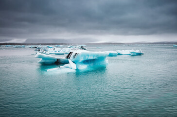 Large pieces of iceberg drifts in the ocean. Location place Jokulsarlon lagoon, Vatnajokull national park, island Iceland.