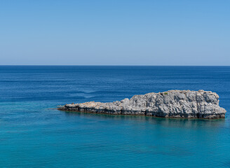 sea and rocks with blue sky in summer