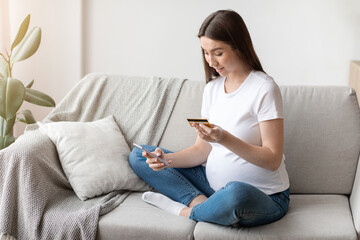 Millennial Pregnant Lady With Smartphone And Credit Card At Home Shopping Online