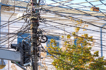pole with wires. wires cables