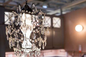 crystal strass lamp white over blurred background, luxury interior design.Luxurious Crystal...