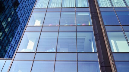 Fragment of glass and metal facade walls. Commercial office buildings. Abstract modern business architecture.