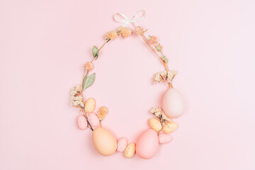 Creative flat lay photo of easter eggs on colorful background.