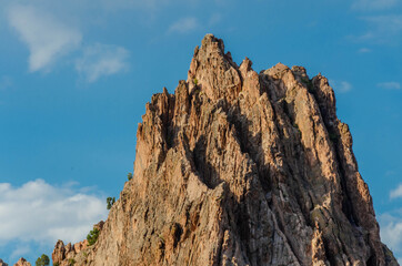 Scenic Rock Formations at Garden of the Gods, Colorado. Beautiful scenic natural mountain peaks. Travel destination location with recreational hiking, biking and rock climbing.