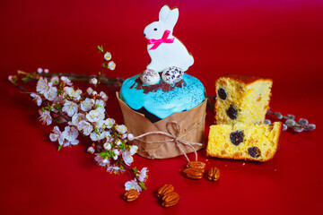 Easter cake on red background.Holiday spring design. Happy Easter.