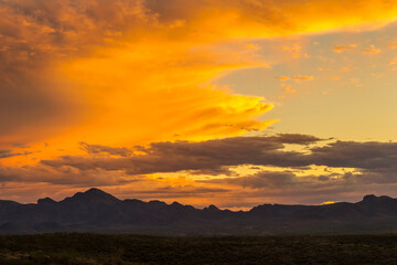 USA, Arizona, Santa Cruz County. Santa Rita Mountains silhouette at sunset.