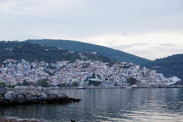 A bay view of Skopelos town in twilight. Skopelos, Greece