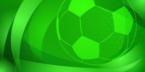 Football or soccer background with big ball in green colors © Olga Moonlight