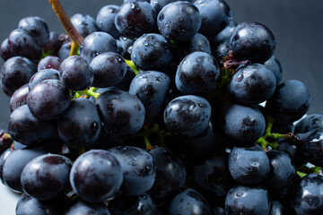Grape bunch on white plate
