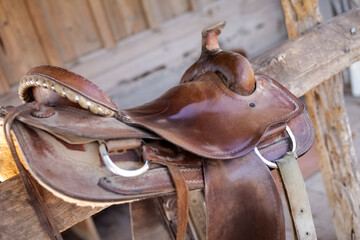 Saddle resting on the railing, Tucson, Arizona, USA.