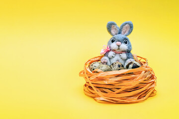 Postcard for Easter. Blank for a postcard with a place to insert text. Easter plush bunny and quail...