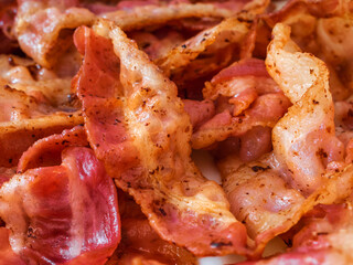 slices of fried bacon close up
