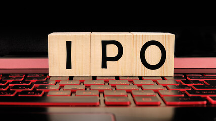 The word IPO is an abbreviation of the Initial Public Offering of shares on wooden blocks lying on the keyboard
