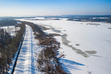 road along the frozen river