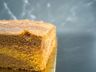 Close-up of a blueberry butter cake. Blurred background