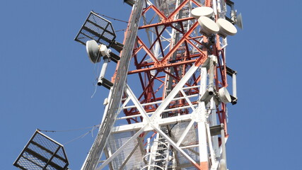 Telecommunication Cellular Tower Against Blue Sky